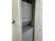 Efficient laundry closet with stacked washer and dryer units, ideal for space-saving convenience at 220 Landing Rd. # I, North Myrtle Beach, SC 29582