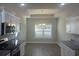 Dining room with chandelier and wood-look flooring at 2347 King Farm Rd., Aynor, SC 29511