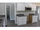 Kitchen features white cabinets, granite counters at 2347 King Farm Rd., Aynor, SC 29511