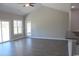 Bright living room featuring hardwood floors, high ceilings and sliding glass doors at 2347 King Farm Rd., Aynor, SC 29511