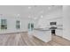 Modern kitchen with stainless appliances, granite counters, and breakfast bar at 397 Sun Colony Blvd., Longs, SC 29568