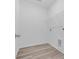 The laundry room features wood-look floors and a wire shelf at 397 Sun Colony Blvd., Longs, SC 29568