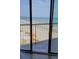 Balcony view showcasing the vast ocean, sandy beach, and a distant pier at 9550 Shore Dr. # 925, Myrtle Beach, SC 29572