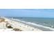 Aerial view of the beach with people and the ocean at 9550 Shore Dr. # 925, Myrtle Beach, SC 29572
