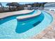 Outdoor lazy river with blue water and surrounding patio at 9550 Shore Dr. # 925, Myrtle Beach, SC 29572