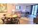 Cozy living room and dining area featuring modern furniture and stylish decor at 9550 Shore Dr. # 925, Myrtle Beach, SC 29572