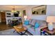 Cozy living room with modern decor, comfortable seating, and an open view into the kitchen area at 9550 Shore Dr. # 925, Myrtle Beach, SC 29572