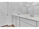 Bathroom with a double sink vanity and a glass enclosed shower at 439 Waterend Dr. # 8, Little River, SC 29566