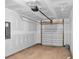 Spacious two car garage with unfinished drywall and bare concrete floor at 439 Waterend Dr. # 8, Little River, SC 29566
