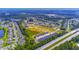 Aerial view of neighborhood under construction with nearby highway at 233 Sandridgebury Dr. # 57, Little River, SC 29566