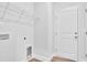 Laundry room with washer/dryer hookups and a wire shelf at 233 Sandridgebury Dr. # 57, Little River, SC 29566