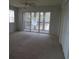 Bright bedroom with sliding glass doors leading to a balcony at 1230 St. George Ln. # B, Myrtle Beach, SC 29588