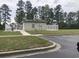 Community pool area with a pool house and grassy area at 1230 St. George Ln. # B, Myrtle Beach, SC 29588