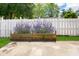 Wooden planter boxes with lavender against a white fence at 660 Cardinal Ave. # 660, Myrtle Beach, SC 29577