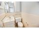 Small bathroom with toilet and sink at 660 Cardinal Ave. # 660, Myrtle Beach, SC 29577