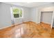 Bedroom with wood floors, window, and closet at 660 Cardinal Ave. # 660, Myrtle Beach, SC 29577