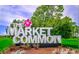 The Market Common community sign with hibiscus flower at 660 Cardinal Ave. # 660, Myrtle Beach, SC 29577