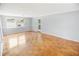 Spacious living room featuring parquet flooring and neutral walls at 660 Cardinal Ave. # 660, Myrtle Beach, SC 29577