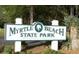 Myrtle Beach State Park sign at entrance at 660 Cardinal Ave. # 660, Myrtle Beach, SC 29577