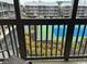 Scenic balcony view of tennis courts and landscaped grounds offering a tranquil setting at 212 2Nd Ave. N # 362, North Myrtle Beach, SC 29582