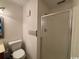 Bathroom with shower, toilet, and light patterned wallpaper at 212 2Nd Ave. N # 362, North Myrtle Beach, SC 29582