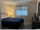 Bedroom with queen size bed, night stand and dresser at 212 2Nd Ave. N # 362, North Myrtle Beach, SC 29582