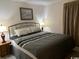 Bedroom with queen size bed, night stand and wood floor at 212 2Nd Ave. N # 362, North Myrtle Beach, SC 29582