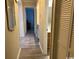 Hallway with wood-look floors leading to bedroom and bath at 212 2Nd Ave. N # 362, North Myrtle Beach, SC 29582