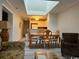 Cozy living area with dining space, flows into a kitchen and a view of natural light from skylight at 212 2Nd Ave. N # 362, North Myrtle Beach, SC 29582