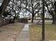 Community picnic area with picnic tables and grill surrounded by mature trees at 212 2Nd Ave. N # 362, North Myrtle Beach, SC 29582