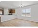 Spacious dining area with hardwood floors and chandelier at 734 Woodside Dr., Conway, SC 29526