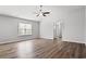 Large main bedroom with hardwood floors and ceiling fan at 734 Woodside Dr., Conway, SC 29526