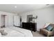 Main bedroom with neutral walls, dresser, and accent chair at 182 Cambridge Dr., Tabor City, NC 28463