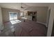 Bright and spacious living room featuring sliding glass doors and vaulted ceiling at Tbd 18 Privetts Rd., Conway, SC 29526
