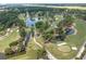 Expansive aerial view showcases a lush golf course with ponds, sand traps, and manicured greens at 1500 Cenith Dr. # F103, North Myrtle Beach, SC 29582