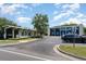 Exterior view of the J. Bryan Floyd Community Center, a recreational space with parking and covered entrance at 1500 Cenith Dr. # F103, North Myrtle Beach, SC 29582