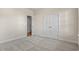 Cozy bedroom features plush carpet, a closet, and a door leading to another room at 623 Carter Reid Ct., Longs, SC 29568