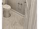 Clean bathroom with toilet and marble-look floor at 2104 Ballast Ct., Myrtle Beach, SC 29579