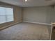 Spacious bedroom with carpeted floor and window at 2104 Ballast Ct., Myrtle Beach, SC 29579