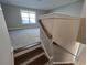 Wooden stairs leading to an open loft area at 2104 Ballast Ct., Myrtle Beach, SC 29579