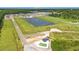 Aerial view of a new housing development with pond and community features at 1127 Cypress Shoal Dr., Conway, SC 29526