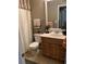 Traditional bathroom featuring a white toilet, wood vanity, and a neutral color scheme at 2276 Essex Dr. # A, Myrtle Beach, SC 29575