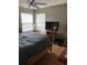 Inviting bedroom with natural light, a large bed, and a ceiling fan offering a comfortable retreat at 2276 Essex Dr. # A, Myrtle Beach, SC 29575