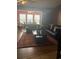 Spacious living room with stylish dark furniture, rug, and natural light at 2276 Essex Dr. # A, Myrtle Beach, SC 29575