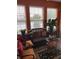 Cozy sunroom with large windows overlooking a scenic lake at 2276 Essex Dr. # A, Myrtle Beach, SC 29575