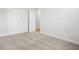 Simple bedroom with carpet and double doors at 4414 Kinlaw St., Little River, SC 29566