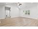 Large main bedroom with hardwood floors, vaulted ceilings, and access to the bathroom at 4414 Kinlaw St., Little River, SC 29566