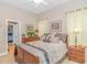Cozy bedroom with neutral walls, decorative artwork, and ample natural light at 5303 Pheasant Dr., North Myrtle Beach, SC 29582