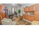 Versatile bonus room with a sink, cabinets, carpet, desk, and natural light at 5303 Pheasant Dr., North Myrtle Beach, SC 29582