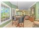 Inviting breakfast nook adjacent to the kitchen with table and view of living room at 5303 Pheasant Dr., North Myrtle Beach, SC 29582